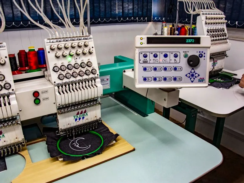 Machine Logo Embroidery — Fine Stitch embroidery Ajman